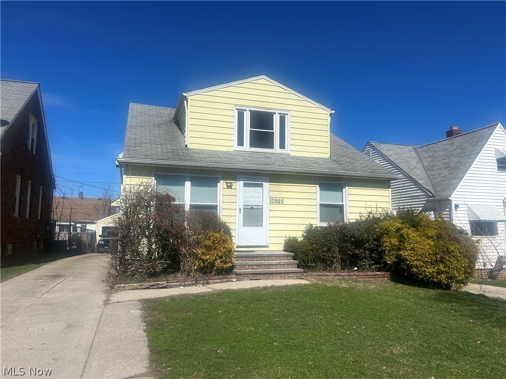 Two-family bungalow in Garfield Heights.  Features a one bedroom unit up with large living room with hardwood floors, and good size eat-in kitchen.  Downstairs features two bedrooms, hardwood floors in living and bedrooms, good size eat-in kitchen.  Both units have access to teh basement with laundry and storage.  Two-car garage.