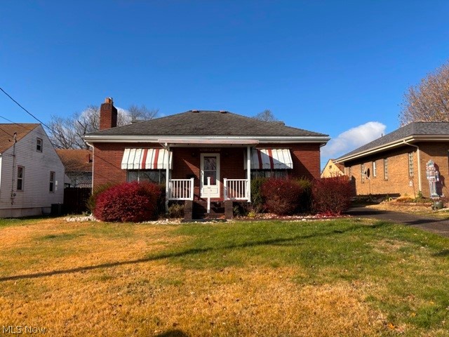 Charming 3-bedroom (2 on the main level), 1.5-bath home situated on a level lot in a well-established neighborhood. The main floor features a partially equipped kitchen with pantry, formal dining room with hardwood flooring, spacious living room with hardwood floors, two comfortable bedrooms, and a full bath. The upper level offers a versatile bonus space that can serve as a third bedroom, home office, craft room, playroom, or whatever best suits your needs.  The full unfinished basement includes a laundry area, half bath, and high ceilings, providing an excellent opportunity to create additional finished living space in the future. Outside, you'll find a fenced backyard and a detached 2-car garage, offering plenty of room for outdoor enjoyment, pets, and storage.  Conveniently located in an established neighborhood, this home is ready for you to add your personal touch and make it your own.