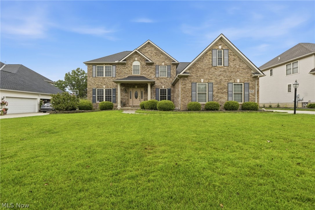 Welcome to this beautifully maintained 4-bedroom, 2.5-bath Colonial in highly sought-after Deer Creek Estates in Middleburgh Heights. Situated on a quiet cul-de-sac and set on a picturesque, park-like lot, this home offers the perfect combination of space, comfort, and versatility for today's lifestyle. Enjoy morning coffee or evening gatherings from the maintenance-free upper deck and lower patio overlooking the beautifully landscaped backyard. The spacious kitchen features abundant cabinetry, generous counter space, a pantry, and a built-in desk area, flowing seamlessly into the dining area and overlooking the backyard. A remodeled
first-floor laundry room and half bath add convenience, while the first-floor office provides the flexibility to serve as a den, library, or work-from-home space. The inviting family room with fireplace is ideal for gathering with family and friends. Upstairs, the
elegant owner's suite features a vaulted ceiling, updated private bath, and oversized walk-in closet. Three additional bedrooms and a full bath provide plenty of room for family and guests. The finished lower level offers exceptional entertainment space, including a theater room, recreation area, and pool table that remains with the home. Above the garage, an insulated 16' x 28' bonus room is ready for your finishing touches and offers endless possibilities. A rare highlight of this property is the attached 3-car garage, heated workshop, and additional rear garage, providing outstanding space for hobbies, projects, vehicles, and storage. Recent updates include the roof, furnace, central air conditioning, and hot water tank. Fresh paint completely throughout and professionally cleaned floors make this home truly move-in ready. Conveniently located just minutes from shopping, dining, parks, highways, and Cleveland Hopkins Airport. Contact your favorite REALTOR to see it today!