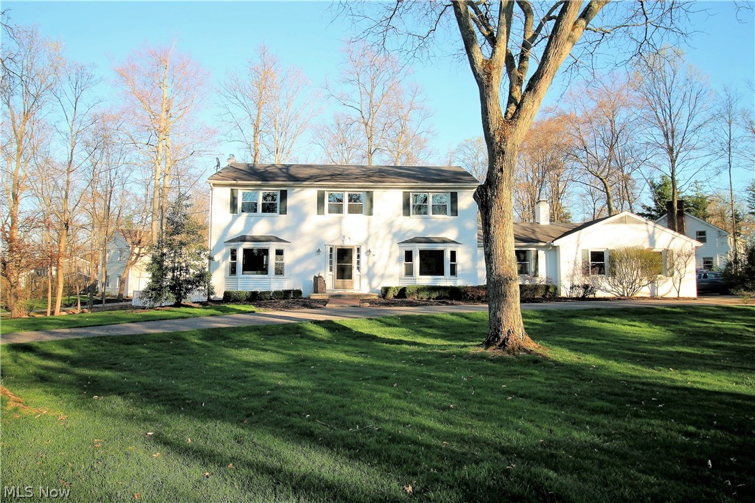 Gorgeous brick colonial with circular drive has a tranquil setting nestled on a beautiful landscaped lot with fenced in rear yard.  This fabulous four bedroom, two full and one half baths offers an open flow floor plan, fabulous for entertaining.  The foyer opens to the living room, and formal dining room each with gorgeous hardwood floors. Gourmet kitchen with maple cabinets, granite counter tops, recessed lights, ceramic floor and high end stainless steel appliances such as a sub zero fridge, dishwasher and oven new 2017 completes this amazing kitchen. The family room is open from the kitchen with hardwood floors, gas fireplace and built in bookcases with a Dutch door in the rear of the home. Completing the first floor is the half bath and laundry room. The upstairs consists of the large master suite with built ins and master bathroom which has a tile shower.  There are three additional bedrooms some with California closets and cedar closets and offering full bathroom. The finished l