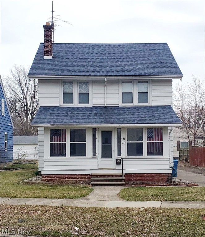 Right Off E Erie. 4 bedroom Colonial,  1.5 baths, with detached 2 car garage. Large enclosed front porch. Fresh paint throughout house, new carpeting in bedrooms with all additional carpets freshly shampooed. Move in Ready!  House has been virtually staged.