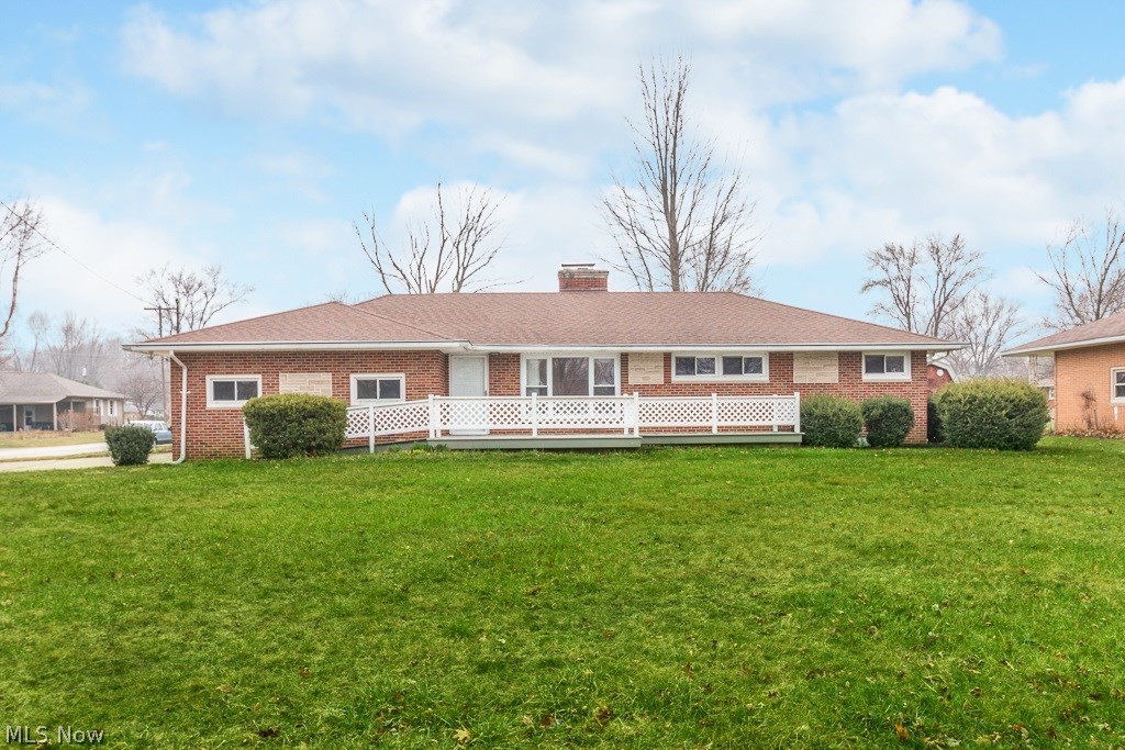 Sprawling brick ranch on a large fully fenced private lot! Incredible layout featuring a galley kitchen w/ natural wood cabs and all appliances staying. Entertain nicely with the huge dining room w/ cozy wood burning fireplace w/ stone hearth and large buffet staying. The living room is wide open w/ neutral decor and gleaming laminate floor coverings w/ brick accent wall. The laminate floors extend thru-out the 1st floor. Roomy bedrooms w/ all having double cedar closets! Newly remodeled full bath which is exceptional! The basement is as big as the 1st floor w/ incredible finish work, wall to wall Frise carpeting and brick accent wall. Basement full bath w/ shower stall and additional storage and work rooms. Great 2 car attached garage w/ it's own 1/2 bath. All vinyl thermal pane windows thru-out. 1 year home warranty provided by US Home!