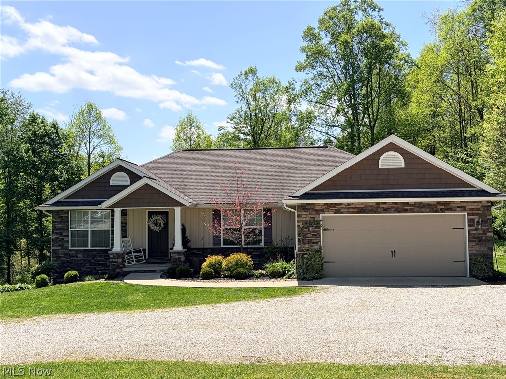Well-maintained 3BR/2BA Ranch Home situated on a corner double lot in the Lake Buckhorn Community. Conveniently located 1/2 mile from the north gate, and a 1/2 mile from Area 8. Built by Schlabach Builders, this home features quality craftsmanship throughout, including solid wood doors and a cozy ventless gas fireplace. The split-bedroom floor plan provides added privacy, while the Cathedral ceilings and an open kitchen, dining, and living area create a spacious feel. First-floor laundry adds to the ease of one-level living. Enjoy the outdoors from the 12x12 maintenance-free deck overlooking the large backyard, or unwind in the hot tub on the 22x26 stamped concrete patio. The yard provides plenty of space for gardening, play, or pets, and includes a 10x20 storage shed. The 13-course walkout basement with large windows offers excellent potential to finish for additional living space. Basement is plumbed for 3rd bath. Located in a private lake community with access to amenities, this home combines comfort, functionality, and outdoor enjoyment.
