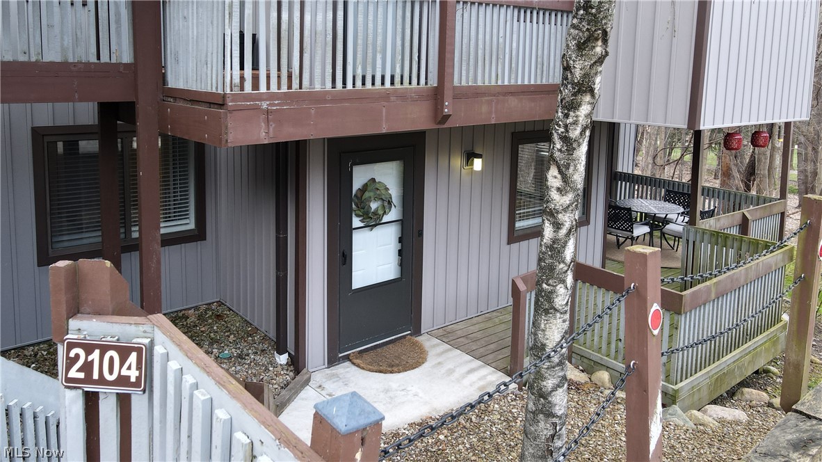 Welcome to 2104 Pinebrook Trl in the delightful Pinemill Ridge condo community. This tastefully updated condo is situated close to the community pool. Conveniently located close to the assigned garage this lower level unit offers quite a bit of privacy. Enter through the front door to an open concept main living area with lots of windows for an abundance of natural light. The kitchen boasts beautiful white cabinets, quartz countertops, and charming breakfast bar. The family room features a stunning wood burning fireplace. The spacious master bedroom offers lots of closet space. Updated full bathroom and in unit laundry complete this unit. Enjoy spending lots of time on your private back deck with views of the forest and company of the birds and chipmunks. The community pool is very well maintained and supervised by life guard. Do not wait to schedule a showing. Super cute unit just waiting for a new loving owner.