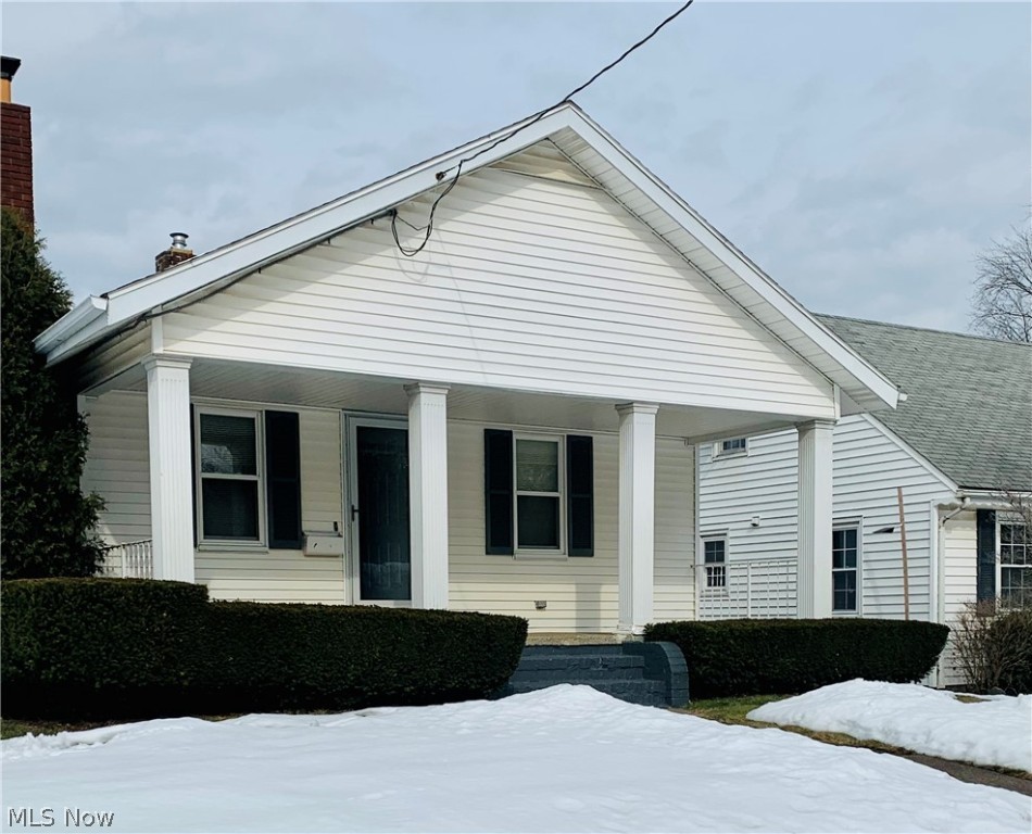 Solid Built home on manicured corner lot.  Newer Furnace and HW tank.  Updated electric. Enclosed back patio + garage (1975).  Just needs your cosmetic updates.  Large WB fireplace. Glass block windows in basement.