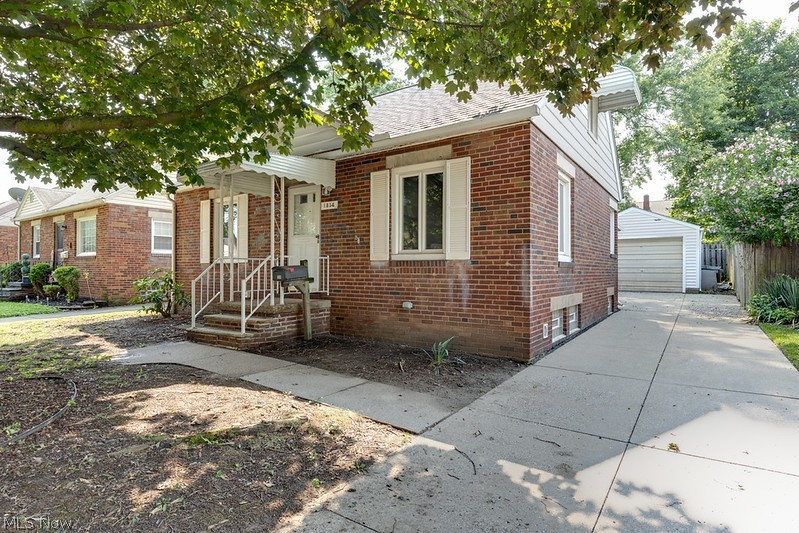 This lovely brick bungalow home offers plenty of charm and character. The main level offers two bedrooms that have been freshly painted and carpeted. The kitchen has been updated with new LVT flooring, and lighting. The main bathroom is a complete renovation with a vanity, flooring, and shower.  Leading to the upstairs you enter into a full bedroom area equipped with new carpet and plenty of storage space. This home is easy access to highway 77, parks, restaurants and more.