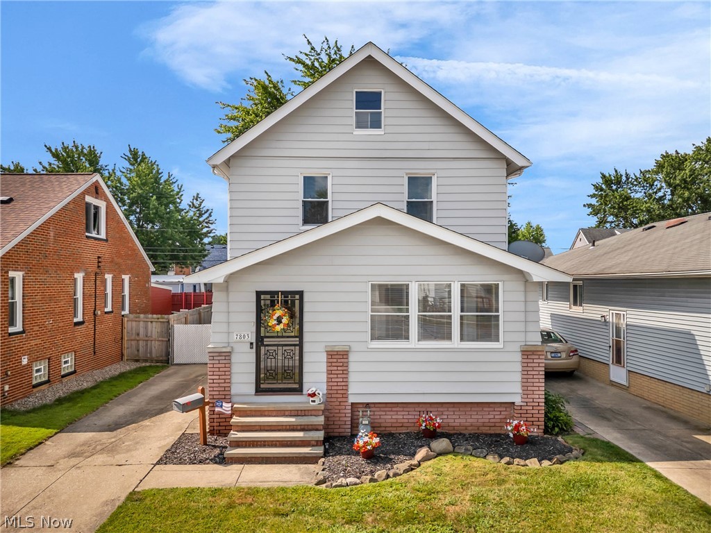 Charming and beautifully updated, this move-in ready colonial in Parma has been meticulously cared for and thoughtfully improved throughout. Step inside through the inviting enclosed front porch, a bright, cozy space that adds valuable extra living area and sets the tone for the warmth you’ll find inside.

The main level features spectacular wood-laminate flooring that complements the rich woodwork and fresh, neutral paint. The spacious living and dining areas are filled with natural light thanks to the lovely bay window, creating an open, welcoming feel. The home feels remarkably spacious. The bright, open layout and generous room sizes give it a comfortable, airy flow that lives much larger than expected. The updated kitchen offers ample cabinet space, stainless steel appliances, and convenient access to the backyard.

Outside, enjoy a fully fenced-in yard with a wood privacy fence and a cozy patio perfect for entertaining, relaxing, or enjoying warm summer evenings.

Upstairs, you’ll find three comfortable bedrooms and a recently updated full bath. The basement provides a clean space and hook ups for laundry and plenty of storage space.

This home offers peace of mind with several major improvements, including a brand-new furnace (2025), a recently serviced A/C unit (2026), and a new electrical panel (2020), as well as additional electrical and lighting updates (2022). The backyard received a fresh update in 2021 with a new privacy fence, gravel patio, back door, and screen door.

Every detail reflects pride of ownership — all that’s left to do is move in and enjoy.