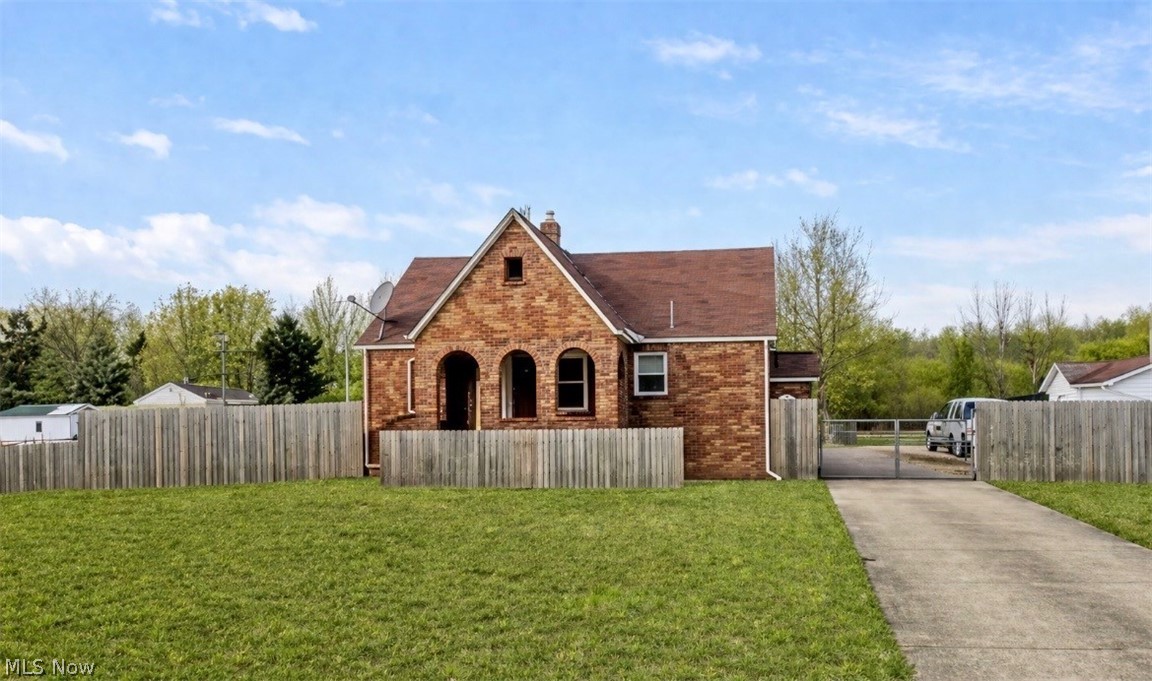 The brick house you've been waiting for has finally hit the market and is now active. Upon entering, you'll notice a spacious living room that seamlessly transitions into the kitchen. The interior features fresh paint, three main-floor bedrooms, and stairs from the bathroom leading up to a versatile space that can be customized to suit your needs, whether it be an office, extra bedroom, or storage. On the lower level, you'll find a full basement and laundry area. Outside, you'll discover a two-car garage detached from the home, as well as an additional garage with extra storage. This property sit on little more than 1.5 acres. Schedule a showing today and make this house your home.