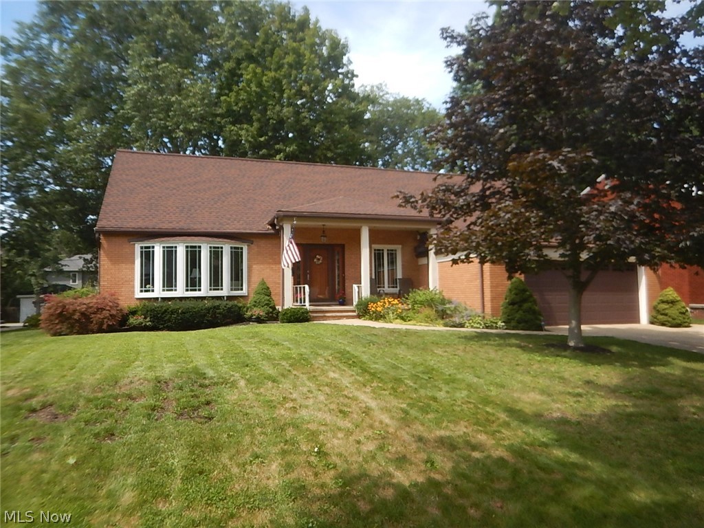 Charming 4 bedroom 2 1/2 bath 
brick Cape Cod with a first floor master suite.  Spacious living room with hardwood floors.  A perfectly sized dining room for large gatherings.  Relaxing family room with fireplace that opens to a enclosed sun room which overlooks the fabulously landscaped fenced in back yard.  There is a convenient laundry room on the first floor as well. Three spacious bedrooms and a full bath are on the second floor. Over 1600 sq. foot partially finished lower level.  Newer furnace and A/C.  Newer roof.  Walking distance to City Center, municipal buildings, large pool, etc.   Close to Town Center, Westgate, all of the venues along center ridge.