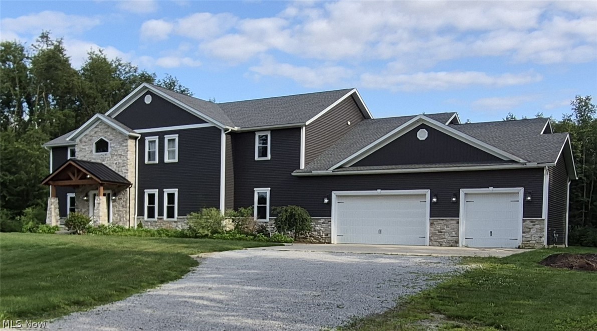 Experience the perfect blend of luxury, privacy, and modern functionality in this custom-built estate nestled on approximately 5 private acres in the heart of Plain Township. Built in 2020, this impressive 6,300-square-foot residence offers six bedrooms, three full bathrooms, one half bath, and thoughtfully designed spaces ideal for entertaining, multigenerational living, remote work, or simply enjoying an elevated lifestyle.

From the moment you enter, you'll appreciate the home's open-concept design, soaring ceilings, and abundance of natural light. The heart of the home is the gourmet kitchen featuring an oversized center island, expansive walk-in pantry, dedicated coffee station, and seamless flow into the spacious living and dining areas—perfect for gatherings of any size.

The luxurious first-floor owner's suite serves as a private retreat with a beautiful tray ceiling and generous proportions. A second main-level bedroom provides exceptional flexibility for guests, a home office, or multigenerational living.

Upstairs, you'll find four generously sized bedrooms and two full bathrooms, offering ample space and privacy for family and guests.

Additional highlights include an oversized three-car garage with direct access to the basement, providing unmatched convenience and functionality for storage, hobbies, or future finished living space.

Outside, enjoy the tranquility of approximately five private acres while remaining just minutes from everyday conveniences. Located around the corner from Diamond Community Park, only four minutes from the Plain Township Amphitheater, shopping, dining, and entertainment, with easy access to I-77 in just 10 minutes and Akron-Canton Airport (CAK) in approximately 13 minutes.

This exceptional custom home offers the rare combination of luxury, space, privacy, and convenience—an extraordinary opportunity in one of Plain Township's most desirable locations.