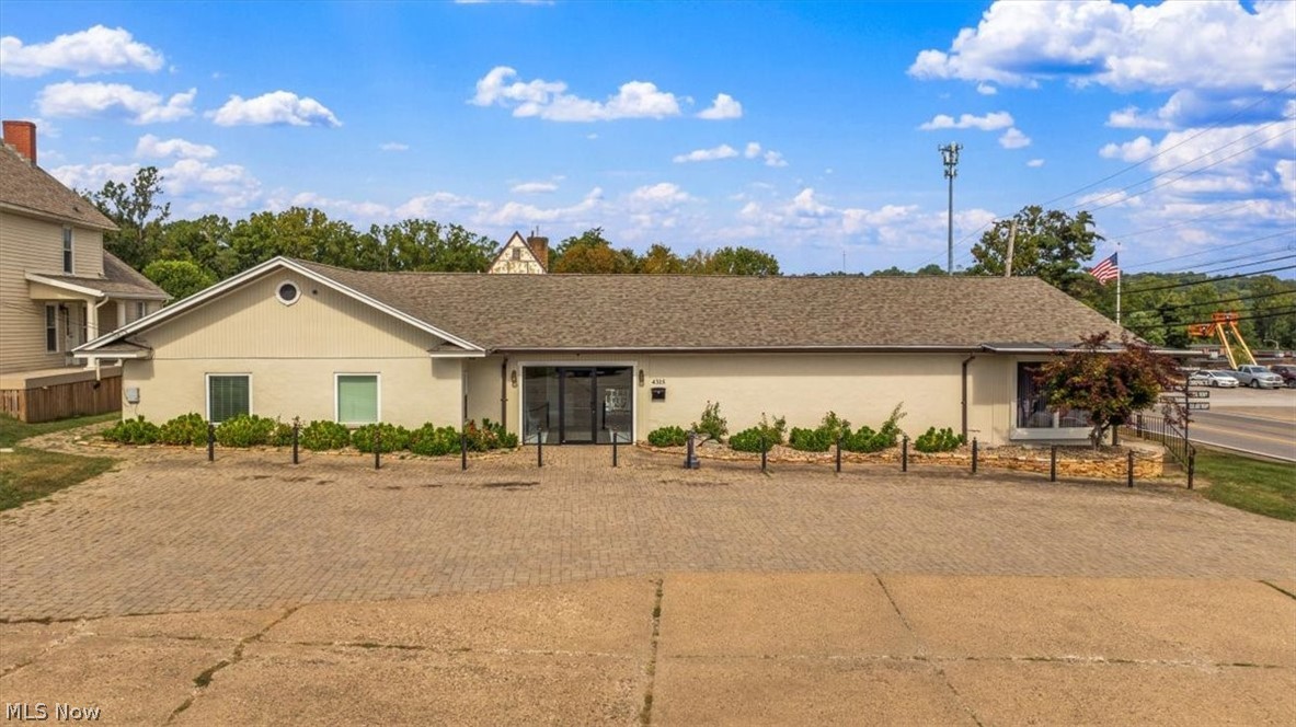 This .55 acre commercial property is centrally located on a prime corner lot at 4315 and 4317 Emerson Ave. in North Parkersburg just 3 miles from I77. The commercial space is currently a working and healthy chiropractic practice and will remain open until close of sale. Emerson Avenue is one of the top three most traveled roads in Parkersburg providing effortless visibility and exposure. According to WVOT with most recent traffic count for this block of Emerson is 15,797 cars daily and 803 trucks. This survey was taken in 2022. This property offers two commercially zoned buildings usable as is for development. Possibilities are endless such as a medical office complex, retail of service business hub, a mixed-use redevelopment site. 4315 Emerson Ave. offers approximately 4,505 SF. New roof in 2023. Newer South and West facing windows. Operated as physical medicine, multidisciplinary facility since 2003, with a practical medical layout. Includes a reception area, 7 treatment rooms & 2 Triage rooms. Includes public restroom handicap assessable. Physical therapy department measures 1,120 SF. This space was recently updated with professional grade flooring. Offers full kitchen with dishwasher, sink, countertops and refrigerator hookup. Office includes built in study with wooden stained bookshelves, two additional rooms, bathroom with laundry facilities. 4317 Emerson is approximately 1,800 SF. two story wooden house relocated to current site in 1960's. Current use is sign shop. Previously a residence, massage therapy facility and office. Includes foyer, front room, two central rooms, kitchen that could be reinstalled if desired, 2 rooms upstairs, full bath needs flooring and fixtures installed. Refer to MLS# 5197428 to combine all parcels together as a package deal. Picture shown of parcel would include all buildings purchased as 1 approximately an acre total. HIGH TRAFFIC LOCATION, EXCELLENT VISIBILITY, MULTIPLE EXISTING STRUCTURES. YOUR VISION, YOUR FUTURE. IT'S HERE!!!