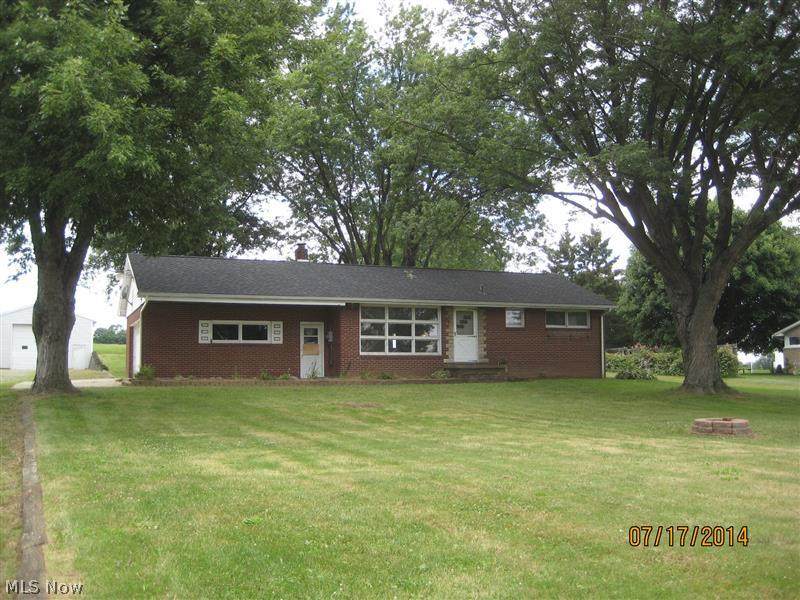 Brick ranch with country setting.  Natural woodwork.  Attached 2 car garage, plus oversized detached garage with electric.  This property is eligible under Freddie Mac First Look Initiative through 10/12/14.  Sold "AS IS".  Buyer to verify all information.  Buyer or buyer's agent responsible to check with Building, Zoning, EPA, DEA, Tax Dept or any other requirement for intended use.  Buyer to pay for all inspections.  Earnest money to be a Cashiers check.  Subject to clear title.  Additional parcel #3701518 included in the lot size.