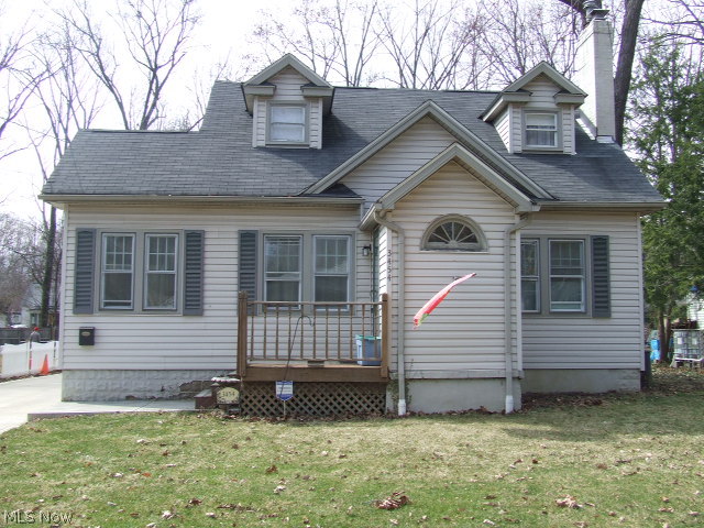 NOT A COOKIE CUTTER HOME!  So much larger than it looks!  Very spacious 5 bedroom Cape.  Situated on one of Stow's prettiest streets, this home is full of character and charm.  Living room features WB fireplace, crown molding and hardwood floors with french doors leading to a quaint reading nook.  Formal dining room is open to the living room and is perfect for hosting holiday parties!  Kitchen has a "farmhouse feel" with updates that include counter tops, backsplash and hardwood floors.  Large first floor master bedroom plus another bedroom and full bath on first floor add to the appeal of this home.  Upstairs you'll find three more bedrooms and a full bath.  Three season sun room leads to a patio and nice fenced backyard with mature trees.  Two car garage.  Other updates include 22 newer windows on first floor, carpeting, glass block, concrete driveway, and garage roof.  Home warranty provided for piece of mind.  A little TLC could make this your unique Dream Home!!