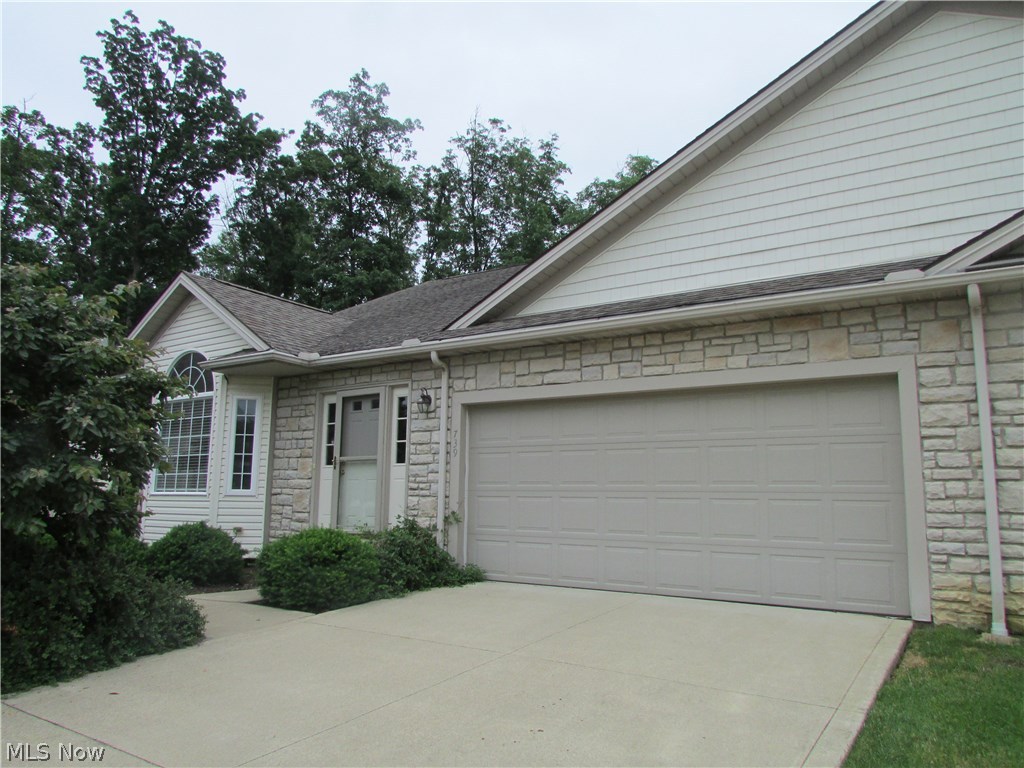 This inviting 2 Bedroom ranch duplex  home features a spacious open floor plan. The eat-in Kitchen offers a vaulted ceiling, eating bay, includes appliances, ceiling fan, and has a Breakfast Bar. An awesome Great Room is accented with a corner gas log fireplace, vaulted ceiling, and Entertainment Center Bump Out, the relaxing 4 Season Sun Room has a vaulted ceiling w/Ceiling Fan and several windows that let in much natural lighting and overlooks a wooded backyard, which leads to a private deck. The Great Room and Sunroom is a great space for people who like to entertain, The Spacious 1st floor Owner's Suite is complete with private bath w/a double vanity, shower, large linen closet and walk-n closet. 1st Floor Laundry w/Washer-Dryer & Built in Cabinets, the 12 course Lower Level offers 1700 sq Ft of finishable space and laid out for optimal finished usage, if needed. Air 2017, newer carpet in great room, Refrigerator approx. 2 years new. Blinds and 6 panel doors throughout. A beautiful