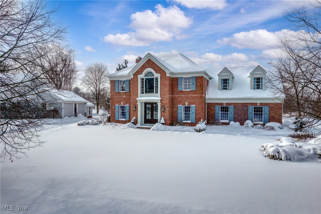 A truly exceptional, one-of-a-kind custom all-brick home offering timeless elegance, impeccable craftsmanship, and modern luxury in the village of Hudson, in the top-ranked Hudson City School District. This stunning home features four spacious bedrooms and three and a half beautifully appointed baths, thoughtfully designed for both everyday comfort and upscale entertaining. Hardwood floors, soaring ceilings, and tall, detailed mouldings set a refined tone throughout. The open floor plan creates effortless flow, anchored by a show-stopping gourmet kitchen equipped with premium finishes and a professional 48-inch gas range, perfect for the home chef. The primary retreat offers the second gas fireplace, custom walk-in dressing room and spa bath. A retreat you'll never want to leave. Custom designs and updates throughout, every space reflects sophistication, balance, and intentional design. The finished lower level adds exceptional versatility, ideal for a media room, play area, home gym, or entertainment. Impeccably maintained and move-in ready, this home delivers luxury without compromise; combining classic architecture with today’s most sought after amenities. Rarely does a property of this caliber, quality, and condition come to market. An extraordinary opportunity to own a residence that truly stands apart.
