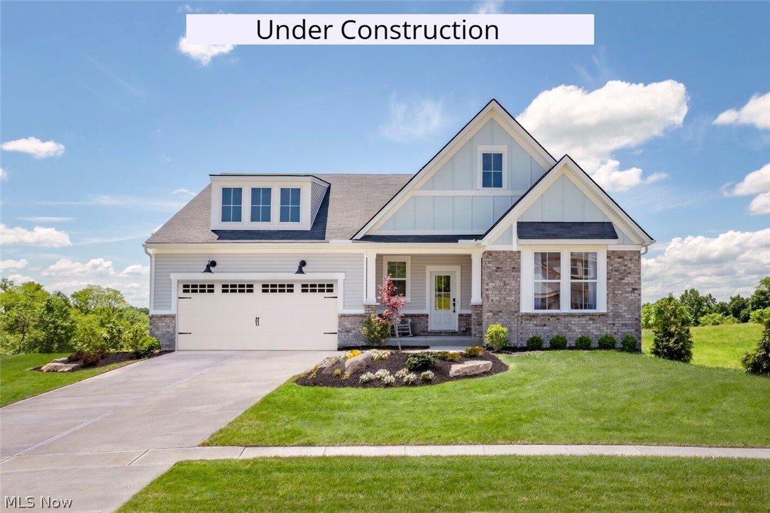 House under construction. Discover easy, low-maintenance living in the Beachwood at Villas of Blue Heron. Set 
in a scenic, park-like community with walking and biking trails, this home includes landscaping and snow 
removal for a truly carefree lifestyle. Enjoy convenient one-level living with an open family room, kitchen, and 
dining area. The private primary suite offers a spacious bath retreat. A separate wing includes two additional 
bedrooms and a full bath—perfect for guests or a home office. Community amenities include a pool, walking 
trails, and tennis and pickleball courts. Pictures are for illustration purposes only.