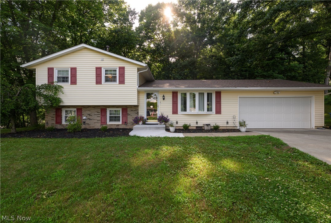 I am pleased to present this beautifully updated split-level home in charming, Canal Fulton!  Located at the end of a private and dead-end street; this lovely home offers 3 bedrooms, 1.5 bath, and just over 1500sqft of wonderful living space!  Walk-in and be greeted by a sizable family room which leads to the dining and kitchen area; a perfect layout for entertaining and cooking without having to miss out on all of the fun!  The dining area also provides convenient access to the back deck and patio area!  Heading upstairs, you will find all 3 bedrooms and the tastefully redone full bath just off of the master!  Heading downstairs, you will find a spacious den-style entertainment area which leads outside to the lower patio!  The back of the property offers tranquil and quiet wooded views with plenty of fully-fenced-in area for the kids and pets to play, alike!  Don’t miss your chance to see this amazing home; call me TODAY for your private showing!