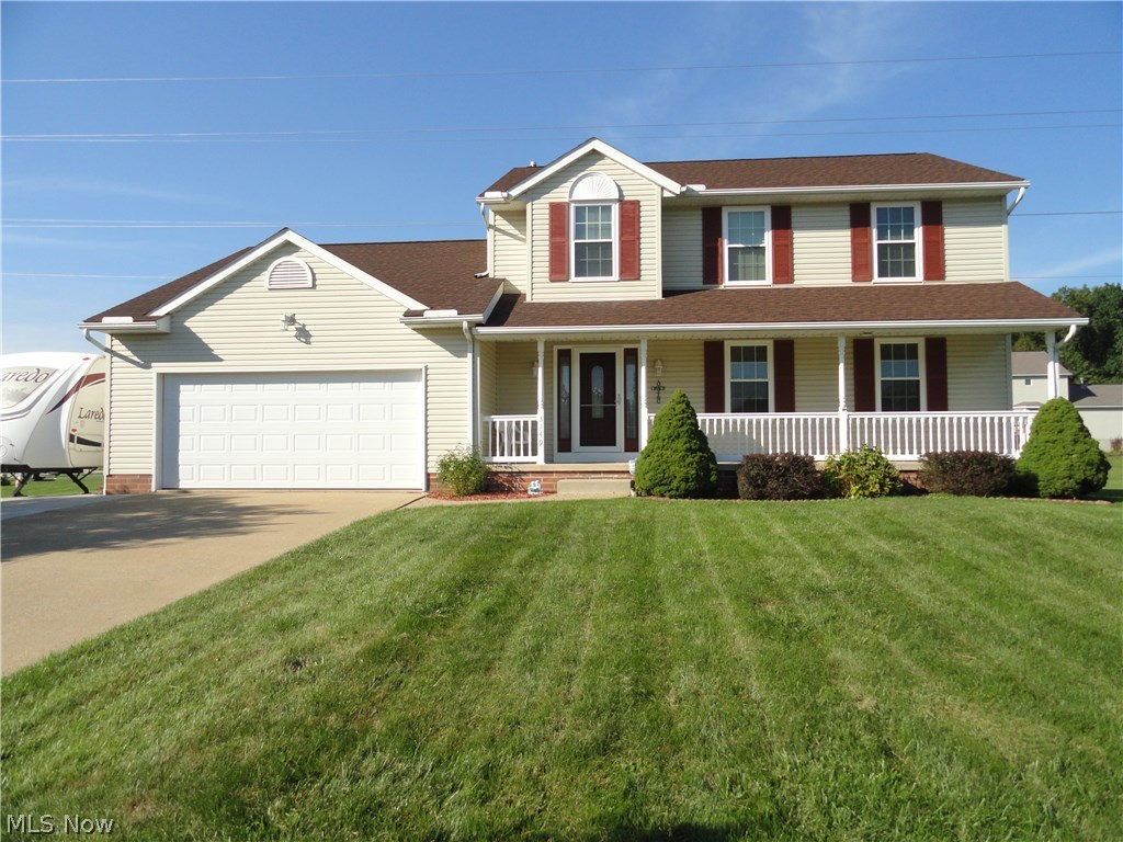 Neutral, open, light and bright!  This beautiful and spacious colonial located in Hidden Knolls  is in pristine condition.  Foyer entry, formal living & dining room, 1/2 bath on first floor,eat-in kitchen opens to huge family room and has sliders to 31 x 16 deck porch and fenced yard.  4 bedrooms and 2 baths up.  Spacious rec room or office in lower level.   Meticulously maintained inside  and out!  All newer doors and windows in 2015 with a 30 year  transferable  warranty,new roof in 2013,  updated appliances, garage door, and new water heater too. New 17 x 45 extra parking pad with 30 amp outlet.  City water and sewer.  All appliances including washer and dryer and a puronics water purifier too! Dont wait!