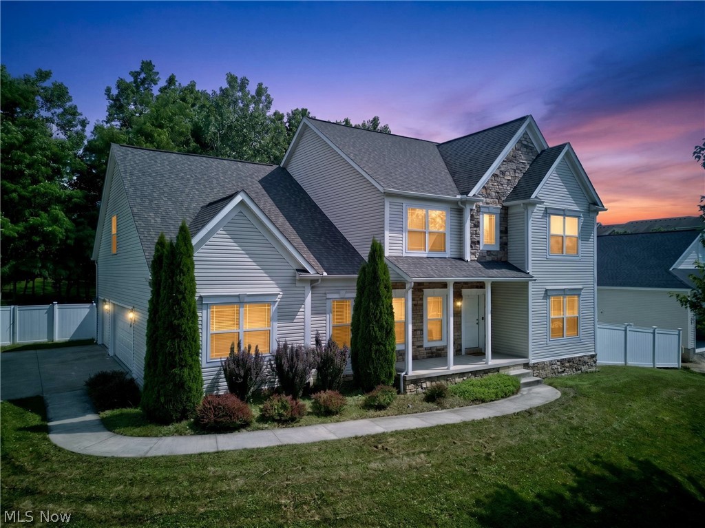 Welcome to this spacious and beautifully maintained 5-bedroom home in Kent! Each generously sized bedroom features its own private full bathroom and walk-in closet, offering exceptional comfort and privacy. Brand new flooring flows throughout the home along with wide doorways that create an open and inviting feel. The main floor also includes an additional half bath for guests.
The large kitchen is equipped with granite countertops and stainless steel appliances, all of which convey with the home. Enjoy gatherings in the spacious formal dining room or relax in the cozy family room featuring a gas fireplace. A large first-floor laundry room adds everyday convenience.
The fully finished basement offers even more living space with a bedroom or office, recreation area, full bath, and tons of storage. Outside, enjoy the large backyard and impressive 3.5-car garage with plenty of room for vehicles, storage, or hobbies. This home offers space, functionality, and flexibility throughout!  With expansive rooms throughout and a flexible floor plan, this home is ideal for multi-generational living, entertaining, or investment potential. This home comes with a 1 year home warranty! Conveniently located near shopping, dining, and Kent State University.