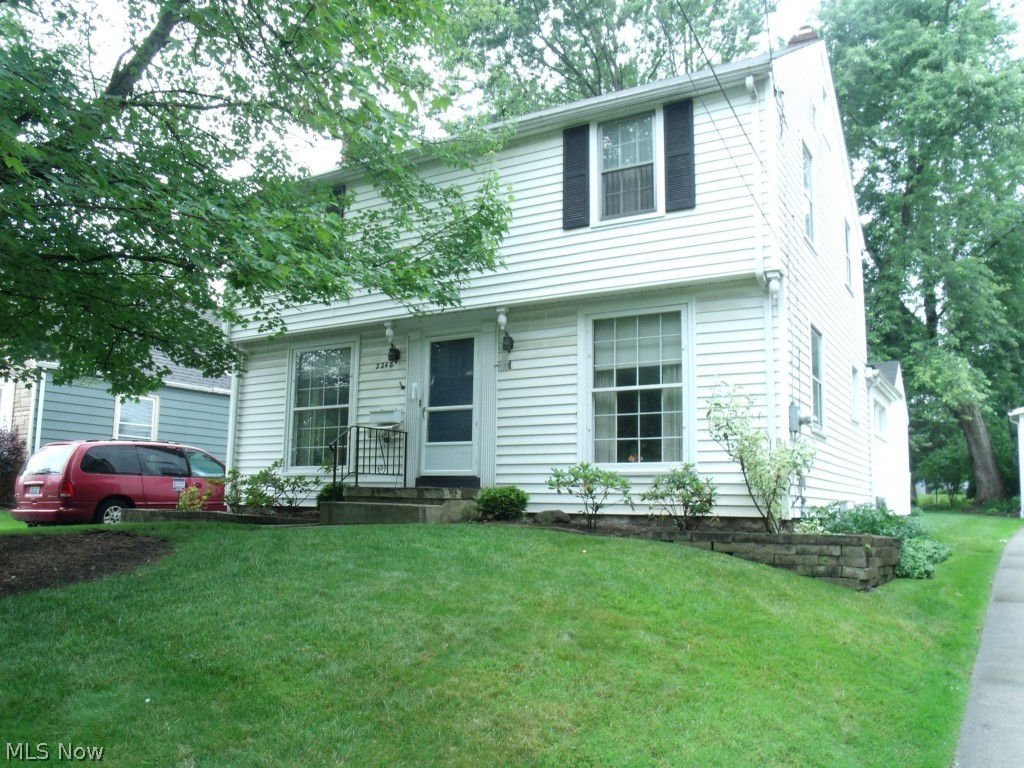 BEAUTIFUL 4 bedroom 2 bath home- EXTREMELY well cared for and CLEAN. With features to include a Large living room with hardwood floors beneath carpeting, plaster walls, stone fireplace with a wood mantle. There are beautiful floor to ceiling windows for great natural light in both Living and Formal Dining room and a set of built-in corner cabinets - add a very nice touch to the dining room. Kitchen has eat-in-breakfast area and pantry. 1st Floor Master bedroom with a convenient jack and jill full bath to the master and the hall.  All three bedrooms have exposed hard wood floors and are Very spacious.  Upstairs bath has tiled surround and original garden tub with seating. The Knotty pine rec room down stairs has a brick fireplace and book shelves.... separate laundry and workshop area, energy efficient furnace and a/c - the washer and dryer are negotiable with any offer.  Lush back yard with a carport and an attached garage.  Call today to see this well kept North side Home!