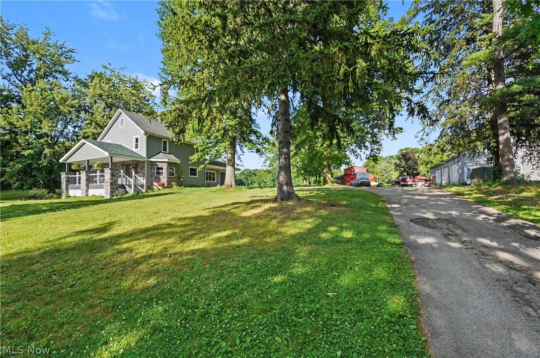 Every once in awhile a home comes on the market that just has that nostalgic feeling of "Home", and a comfortable place to set down roots. This is one of those homes! Nestled on 16.33 acres, this traditional farm house has everything you need to start homesteading, to start a farm, or just enjoy being away from the city. Maybe you just want to use the large (60x38) detached garage for all your toys! This detached garage is heated and has electric, so could be the perfect fit for a home business. The house features 4 bedrooms, 1.5 bathrooms, a spacious eat in kitchen, a paneled family room with a cozy wood burning fireplace, and a separate front living room. There is a 1st floor primary suite with a half bath. It also has an inviting covered front porch and a 1 car attached garage. The property boasts fenced pastures, a roughly 1 acre stocked pond, a gas well that is currently providing roughly $300 annual royalty checks AND provides FREE GAS to the owners! The livestock barn previously housed horses. The owners are currently cleaning out the stalls as they had become temporary storage for a family member. This is a wonderful opportunity to grab some land, yet stay close enough to modern conveniences. Please note for the house size, that the tax record states 2,533 sqft. Previous MLS stated 1,589 sqft. The Matterport tour gave room dimensions, and a rough calculation put the sqft around 1,908. So buyer to do their own due diligence for accuracy. Call your favorite realtor and visit soon!