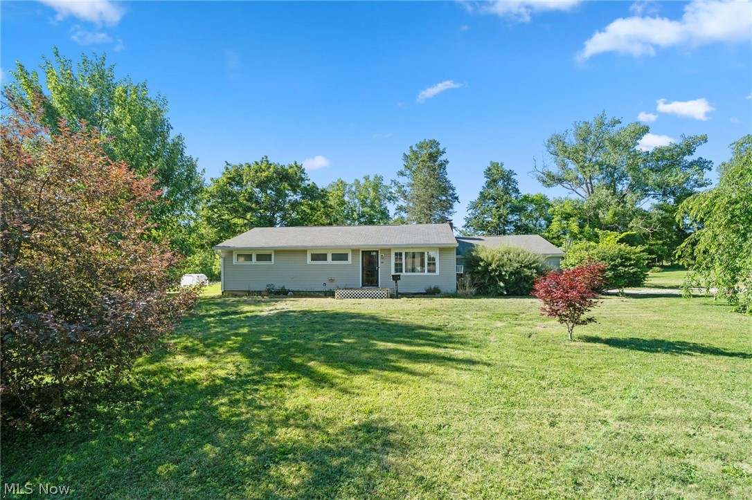 Bring your design ideas and sweat equity to this 3-bedroom, 2-bathroom ranch home offering incredible potential in the heart of Lodi. Situated on a generous 0.35-acre lot, this property is the perfect canvas for your next flip, rental addition, or personalized primary residence.  

The main level features a classic single-story layout with a functional living space and bedrooms waiting for a fresh lease on life. Head downstairs to find a full footprint basement that offers endless possibilities including a second bathroom area currently primed for your custom finishes and structural updates. Step outside to enjoy a sprawling, open backyard complete with mature trees and a standalone storage shed, giving you plenty of space for outdoor activities or landscaping projects. 

The property also features a long gravel driveway leading up to a large, detached 2-car garage equipped with a front-facing concrete pad. This home provides a country feel while keeping you minutes away from local Lodi amenities, shopping, dining, and easy highway access.

Property is being sold AS-IS. Don't miss out on a fantastic opportunity to build instant equity in Medina County.