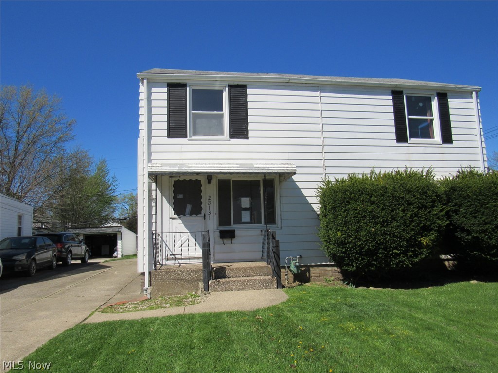 Don't miss out on this half-duplex conveniently located on a corner lot!  Spacious living area, dining room, and kitchen leading out to a sunroom with access to the backyard.  Two bedrooms and full bath upstairs!  Full basement with many possibilities!  Oversized two car garage with openers!  Well manicured, partially fenced backyard!  Call today!