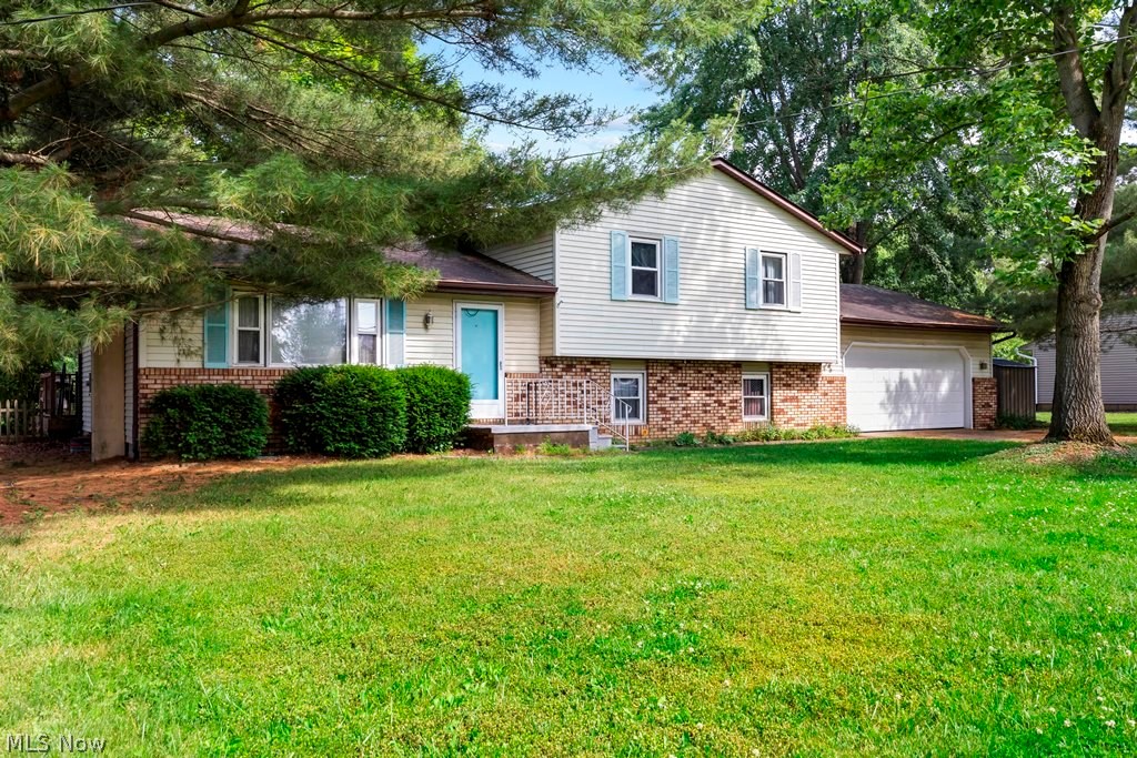 Large Quad Level Split situated on a half acre lot on the Indian Hollow Golf course. This home features 4 bedrooms, 2 full baths, family room with a fireplace, formal dining room open to the living room and a basement!  The windows have been updated, appliances are staying, there is a large deck and a salt water swimming pool!    Located in the Keystone school district and just 10 minutes to 10/480. Immediate Possession! The front steps will be replaced by Elyria Concrete Step in the next 2 weeks.