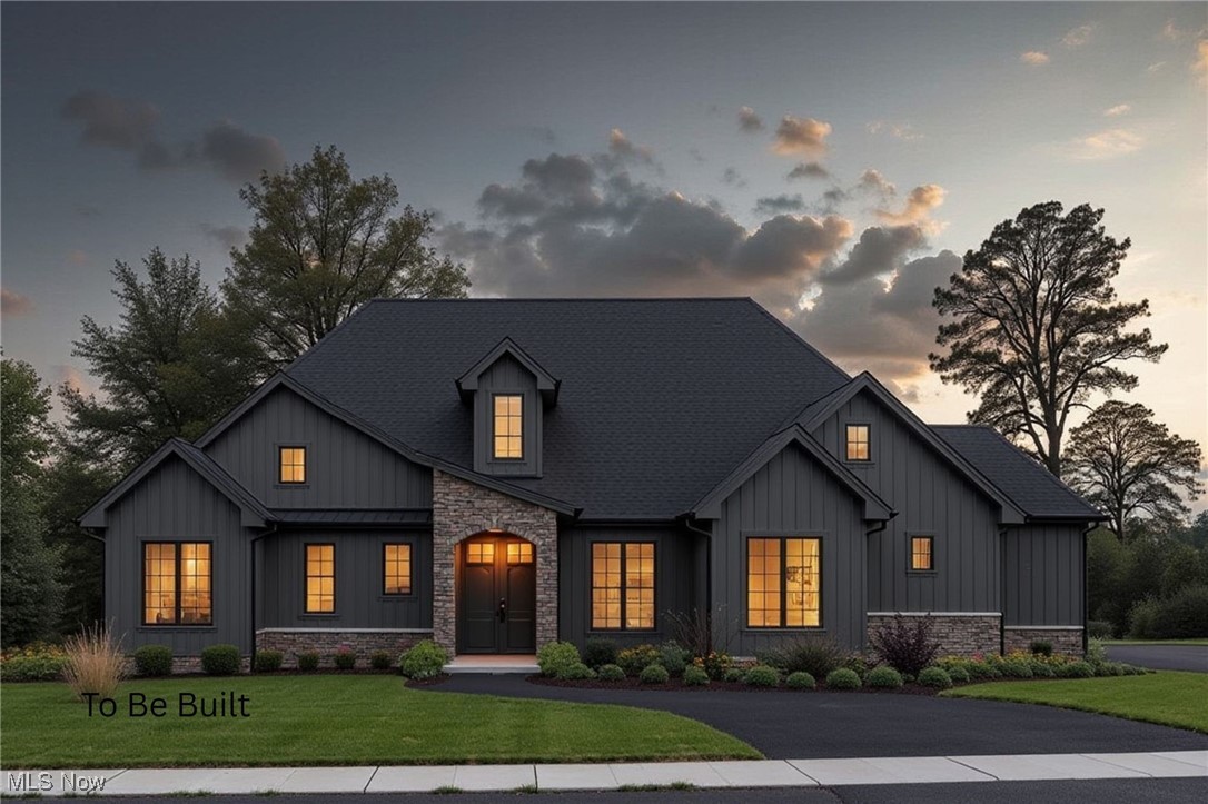 Phase 2 of Lakewood Estates in Canal Fulton is now open with 33 new lots available ranging from just under 1/2 acre to 2+ acre lot sizes with lot prices starting at $85,000 (call for details), where Modern Home Concepts delivers energy-efficient, modern living paired with stunning architecture. These to-be-built homes feature an open-concept floor plan & high-end finishes tailored to today’s lifestyle. Build this 3 bedroom, 2 full & 1 half bath colonial style home with a first floor primary suite or 2nd floor suite with basement or ask about other opportunities to build in this development. Step into a spacious foyer leading to a home office. The large 2 story great room opens to a beautiful yard with optional covered patio & add a cozy stone fireplace, perfect for cooler months. The chef’s kitchen stands out with custom maple cabinetry, soft-close drawers & doors, a large center island, sleek quartz countertops, stainless steel appliances & a generous walk-in pantry. The owner’s suite offers a luxurious retreat with optional oversized tiled shower, soaking tub, dual vanities & a spacious walk-in closet. Head upstairs to two additional bedrooms (with options to add more bedrooms/baths) that share a full bath with dual sinks, quartz counters, and durable LVT flooring. Convenience is key with a mudroom and laundry room conveniently located on the main level. Also features an optional partially finished basement with a half bath or full, with the potential for a rec room, fourth bedroom & full bath in the unfinished portion. As an Energy Star® builder, Modern Home Concepts includes energy-efficient windows, solid core doors & quartz countertops as standard, along with a one-year builder warranty & a 20-year foundation warranty. Photos are for illustration purposes only. Call for more details!