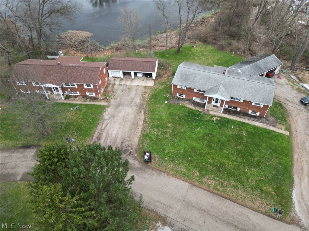 Special opportunity to own a quad brick multi-family property offers all 2-bedroom, 1-bath units with public utilities, common laundry, carport and surface parking, gas hot water/steam heat, and wall A/C units. With multiple occupied units and income already in place, this property presents an excellent opportunity for investors seeking to expand their portfolio with a well-located residential income asset in Lake Township.