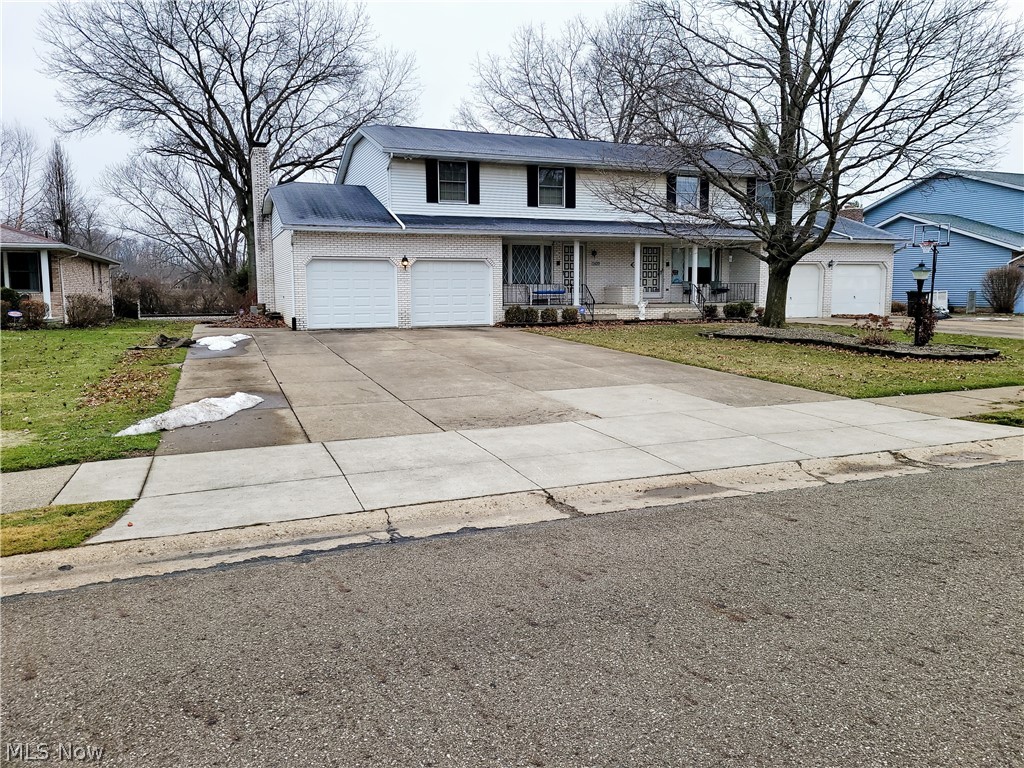 Brick and vinyl duplex in great area and super large with finished rec rooms. Month to month tenancy for tenants and plenty of potential here. Close to Gervasi Vineyards, Trails right behind unit. Overlooks large pond. Close to shopping, restaurants, and interstates. Master Bedroom with full bath and walk-in closets, 2 other large bedrooms. Large deck off of family room with French doors. Family room has fireplace.