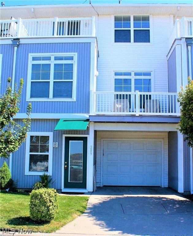 Amazing Multi-level Townhouse with a Marina view on the Black River in Lorain. Stunning Balcony Views of the  Spitzer Marina. This 2 Bedroom, 2 1/2 Bath is located in Harbor Walk on The Black River.  This unit is within walking distance of the Monkey Island Coffee Cafe, Boiler Room Restaurant, Community Center, Fitness Center and 2 pools. This unit boasts news floors in foyer and bathroom, New Ceiling fans in Great room and Bedrooms, Brand new gas fireplace with rocks installed within the last 6 months. Deck entrance is from Living room and 2nd floor deck entrance from bedroom. 
Leased Boat slips available thru Spitzer Marina. All Appliances included.  1 1/2 attached car garage. 
Don't miss this great opportunity to own that spot in the marina with boats and water!!