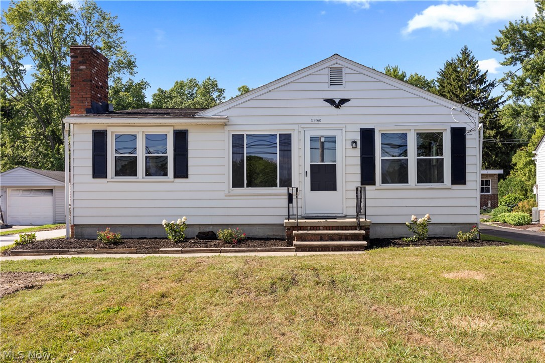 Nestled on a spacious homesite well over 1/2 acre in Amherst Township! Conveniently located in a great proximity to all that Amherst and western Lorain area offers for dining, shopping etc. This ranch with a basement has been recently refreshed inside and out!  Step into a large L-shaped living room with LVP flooring and lots of natural light. There is a cozy nook area of the living room with a full wall fireplace which makes it the perfect space as a sitting area! The kitchen is beautifully updated with new appealing cabinets, granite countertops, stainless steel dishwasher/microwave and range! Beautiful tile backsplash too! The eating area overlooks the sitting area. There are three bedrooms and an recently updated full bathroom.You'll appreciate the new flooring that has yet to be lived on. Detched 2 car garage and a full basement for storage! BRAND NEW CENTRAL AIR 2026! A wonderful opportunity for a tastefully appointed and move in ready home in the Amherst area!