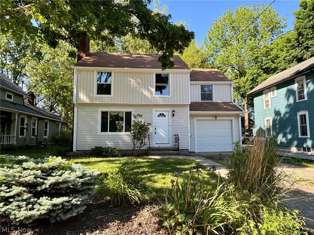 Welcome to this beautifully updated 3-bedroom, 2-full-bath home in the desirable Kent City School District! Conveniently located near downtown Kent and Kent State University, this home offers a blend of modern updates and timeless character.

The main level features a welcoming living room with a fireplace, a formal dining room with original built-in cabinets, and a completely renovated kitchen with new cabinetry, granite countertops, and a full stainless steel appliance suite including a dishwasher. Refinished original wood floors and charming woodwork preserve the character of the home while blending seamlessly with the modern updates.

Upstairs, you’ll find three generously sized bedrooms and a full bathroom, offering comfortable and functional living space. The finished basement expands the home with a spacious recreation room featuring durable LVP flooring, a second full bathroom, and laundry area.

Exterior improvements include new board and batten siding, gutters, garage door, front door, and the majority of windows replaced for improved efficiency and curb appeal. The newer roof provides added peace of mind for the next owner. An attached 1-car garage completes the property.

With thoughtful updates, preserved original character, and a convenient location close to shopping, dining, parks, and campus amenities, this move-in ready home is ready for its next chapter. Schedule your private showing today!