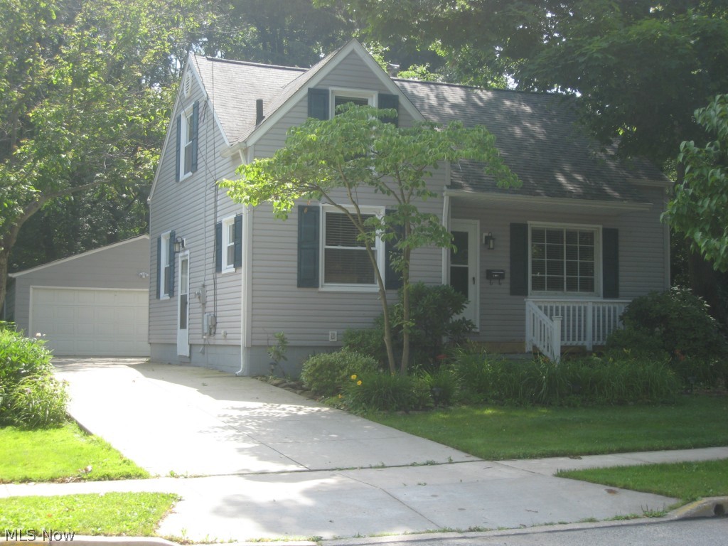 Move in ready and fast possession!  Nestled in the trees this updated cape is minutes from the Kent State University campus.  Walk in and place your furniture and you are done! Ample living room welcomes you as you walk on into the newer kitchen with granite counter tops and ceramic backsplash! Nice sized rooms and great storage. The master suite is suitable for a king size bed and has a walk in closet. There is a smaller room this level that could be used as an office/bedroom.  The finished lower level adds and additional 373 sq. ft. of living area.  Finished laundry room with closet.  Updates include furnace, central air, kitchen, bath, roof, vinyl windows,and vinyl siding.  It is a beauty!  Private yard with lush landscape, deck and patio area.  Over sized 2 car garage provides additional storage.