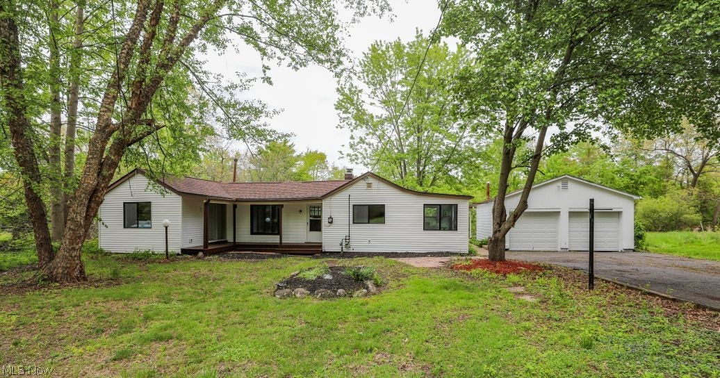 Welcome to your private waterfront retreat in Portage Lakes!  Nestled on 0.89 of an acre along a peaceful lake tributary, this fully remodeled Ranch combines modern updates with the beauty of nature and lakeside living.  Surrounded by trees and tranquil scenery, this property offers the perfect escape while still being just minutes from the heart of Portage Lakes!
This 3-bedroom, 2.5 bath home features 1,576 sq. ft. of living space with new vinyl plank flooring throughout, creating a clean and contemporary feel.  Major improvements include a new roof, new siding, new windows, and a new hot water heater, giving buyers added confidence and peace of mind.
The detached 2-car garage provides excellent storage and workspace, while the expansive lot offers plenty of room to relax, entertain, or enjoy the surrounding wildlife and water views.  This remodeled Ranch provides a unique opportunity to enjoy privacy, nature and waterfront charm all in one property.