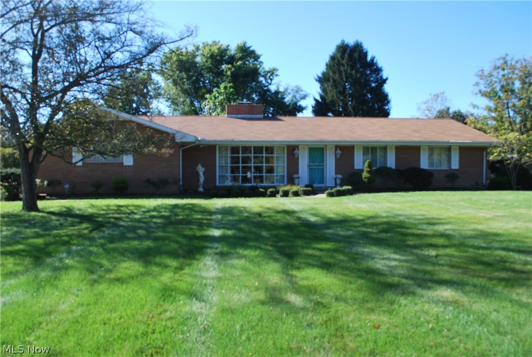 This 3 bedroom, 2 bath all brick ranch features large living area with floor to ceiling bay window, exposed beam ceiling in family room and covered patio.   The fully applianced eat-in kitchen  is perfect for entertaining and offers a large bar.  Furnace was replaced 2/18.   Convenient to all North-end amenities and Zanesville Country Club this value priced home is ready to move into.  Seller is related to listing agent.