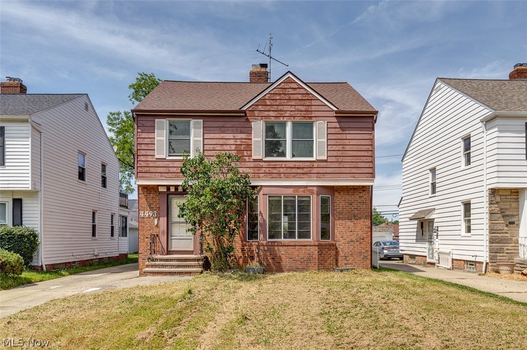 Just a stone's throw from Green Road, this classic University Heights colonial offers the space and layout today's buyers are looking for. The first floor features hardwood floors, a spacious living room, formal dining room, and an oversized family room with plenty of space to gather. The eat-in kitchen overlooks the backyard and offers room for everyday meals, homework, or your morning coffee. The oversized first-floor family room provides that extra flex space everyone seems to need, whether for movie nights, a playroom, hobbies, or simply spreading out. Upstairs, you'll find three comfortable bedrooms and one full bath, plus a convenient first-floor powder room. A full basement offers additional space for recreation, exercise equipment, storage, or a home office setup. The backyard and detached garage provide room for gardening, entertaining friends and family, or simply enjoying a quiet evening outdoors. Conveniently located near shopping, dining, parks, schools, and everyday amenities, this home offers a wonderful opportunity to enjoy all that University Heights has to offer.