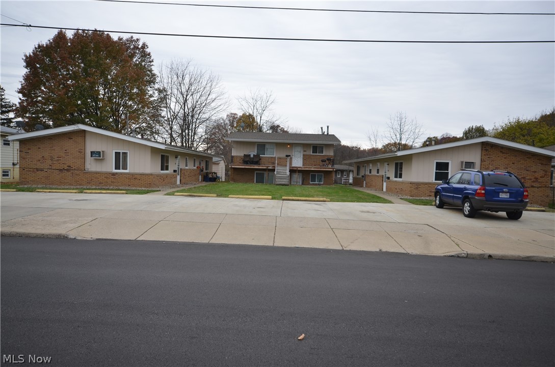 3 duplexes, 6-2 bedroom units average $565/mo rent. Tenants pay gas and electric, owner pays water/sewer/trash. Lot is 110' x 120', one car garage in rear could be rented for storage. All new windows and roofs.