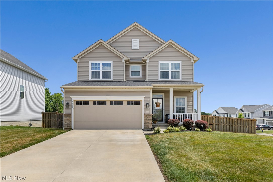 Some homes check the boxes... This one steals your heart.

From the moment you step inside, you'll notice this home was built for the way life is meant to be lived. The stunning stone fireplace anchors the spacious living room, creating the perfect place to gather after a long day, while the open-concept kitchen, complete with an oversized island, granite countertops, stainless steel appliances, and abundant cabinetry, keeps everyone connected whether you're cooking dinner or hosting the holidays.

Just upstairs, you'll find one of my favorite spaces in the entire home... a cozy loft that practically begs for slow mornings with a cup of coffee, an afternoon book, or your favorite evening show before calling it a night.

Need even more room? The beautifully finished lower level, complete with its own full bath, offers the flexibility for movie nights, game days, overnight guests, a home gym, or simply a quiet escape from the hustle of everyday life.
Then... there's the backyard.

And trust me, you're going to want to spend your summers here. The expansive composite deck, with its covered lounge, lower patio, fire pit, and fully fenced yard, creates an outdoor retreat that's every bit as impressive as the interior. Whether you're hosting family cookouts, cheering on your favorite football team, or enjoying peaceful evenings under the stars, this backyard was designed to make memories.

With three bedrooms, three full bathrooms, a half bath, and beautifully finished living space on every level, this isn't just another house... It's the home everyone hopes they'll find.