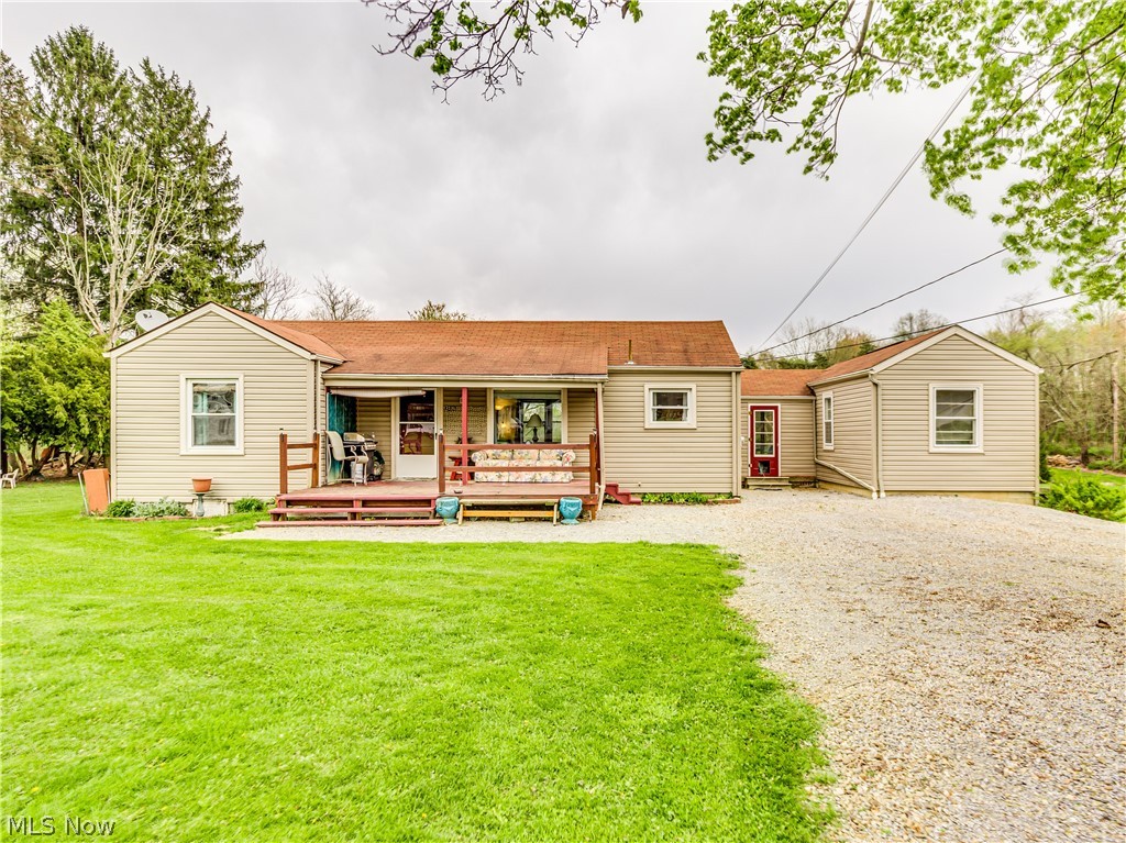 This super charming ranch style home is nestled in a beautiful 2.2 acre setting with a country feel but so conveniently located near everything! Welcoming living room with wood flooring, sunny kitchen with lots of cabinet space, very spacious 11 x 25 family room, three bedrooms and an updated full bath with newer laminate flooring. The walk out lower level offers plenty of storage space. Updates include new electric service (2017), some new copper plumbing (2019). Furnace installed 2007, central air conditioning 2008, water heater 2008. Lovely, private backyard. Don't miss this fantastic opportunity!