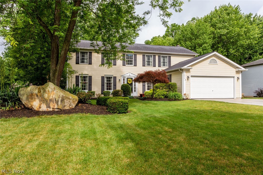 MOVE IN READY!!  Beautifully updated 2820 sf colonial home in the secluded Creekview Development in Avon. The fresh paint colors and updated light fixture make the open front foyer bright and airy.  To the right, the home office has a wall of built in shelves and double french doors for privacy when needed.  To the left, the open living and dining room have wood floors and large windows for larger family gatherings and parties.  In the back, the spacious eat in kitchen with granite countertops, island, large pantry, and bay window is open to the family room which offers a brick fireplace and french doors to the back patio. All of the solid wood base boards, trim boards and doors have been painted to really update this home. All of the ceiling fans and most light fixtures have been updated.   The half bath and  first floor laundry are off of the garage for easy accessibility from outside. Upstairs, the large master suite has an updated master bath with new tub and beautiful tile floor a