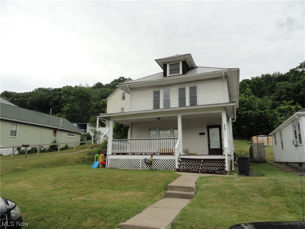Great house in Newell with 3 bedrooms, bath, HUGE living room and dining room, and oak built-ins in dining room and butler pantry.  New metal roof, recent HVAC, huge covered porch and nice yard.  Priced to sell!  Finished attic houses home office and bonus room.