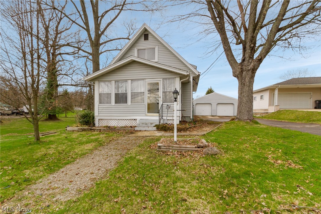 Sitting on over half an acre this gorgeous cape cod home has a recently updated first floor including fresh paint and new flooring. The enclosed porch lets plenty of natural light into the home. Leading upstairs you will find original woodwork on the banister and the built-ins.