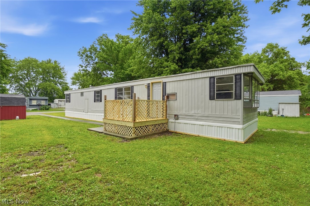 Completely remodeled and move-in ready, this 3-bedroom, 1-bath home in Austin Woods offers affordable living with extensive updates throughout. The home has been thoughtfully renovated from top to bottom, featuring all new drywall, water supply lines, subflooring, luxury vinyl plank flooring, fresh paint, and updated electrical service with circuit breakers. The updated kitchen includes new cabinetry, countertops, stove, exhaust hood, and refrigerator, while the remodeled bathroom provides a clean, modern feel. Additional interior improvements include a new hot water heater, new interior doors, and a new front entry door. Outside, you'll find freshly painted exterior siding, a new 8' x 8' deck, all new skirting installed in 2026, and a roof coating completed in 2024 for added peace of mind.
