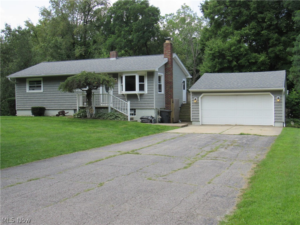 Raised ranch on approximately 0.82 acres. Located in Ashtabula Township, Buckeye Local School system, this 3 bedroom 2 bath home was a completely fenced in backyard, fire pit, large deck and detached 2 car garage. The basement has a family room with fireplace, additional area to make another bedroom, full bath that needs completed, Laundry area, utility space and also is a walk-out to the backyard. Roof is approximately 11 years old. Dead-end street so traffic is at a minimum. Schedule to see this one-coming soon!