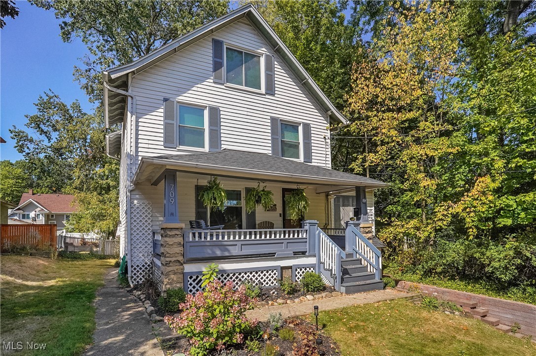 Welcome to this charming century home nestled on a picturesque brick street in the highly desirable Highland Square neighborhood. Character and charm are showcased throughout this home including curved archways, hardwood floors, wood doors with vintage glass knobs, classic crown molding, wide baseboards, and custom built-ins that reflect the craftsmanship of that era.
Enter into the spacious living room, where natural light is abundant with large windows and crown molding in the adjacent sunroom/office.   The formal dining room is perfect for entertaining, featuring stunning built-in cabinetry.  The updated kitchen offers granite counters, and a convenient powder room completes the first floor.  Upstairs, you’ll find three comfortable bedrooms and a full bath, while the third floor offers a private fourth bedroom featuring a walk-in closet. Updates include:  New Roof - August, 2025; Furnace and hot water tank - 2023; AC - 2018.   An attached one-car garage adds everyday practicality to this unique and character-rich home. Close to the Cuyahoga Valley National Park, restaurants, and library  don’t miss your chance to own a piece of Highland Square’s history on one of its most charming streets!