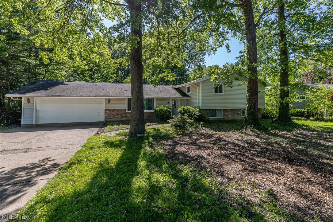 Don’t miss your opportunity to own this beautifully maintained, spacious home offering 4 bedrooms, 3 full bathrooms, and plenty of room to live, relax, and entertain in a highly desirable Mentor neighborhood.

Inside, you’ll love the bright open kitchen featuring quartz countertops, abundant cabinetry, and generous space for cooking and gathering. The second floor showcases beautiful hardwood floors, 3 generously sized bedrooms along with the large master bedroom that boasts an en suite bathroom and a large walk-in closet. 

The family room opens to a charming enclosed sunroom complete with skylights and a hanging swing, creating the perfect spot to unwind year-round. The large laundry room offers built-in cabinetry, countertops, and a convenient built-in ironing board for added functionality.

Just off the attached 2.5-car garage, a cozy mudroom/alcove provides the ideal space for shoes, coats, and everyday essentials tucked neatly out of sight. Step outside to enjoy the backyard featuring a playhouse with attached shed—perfect as a play space, hobby retreat, or extra outdoor getaway.

The new windows in the home helps with energy efficiency as well. Don't miss the opportunity to make this house your home!