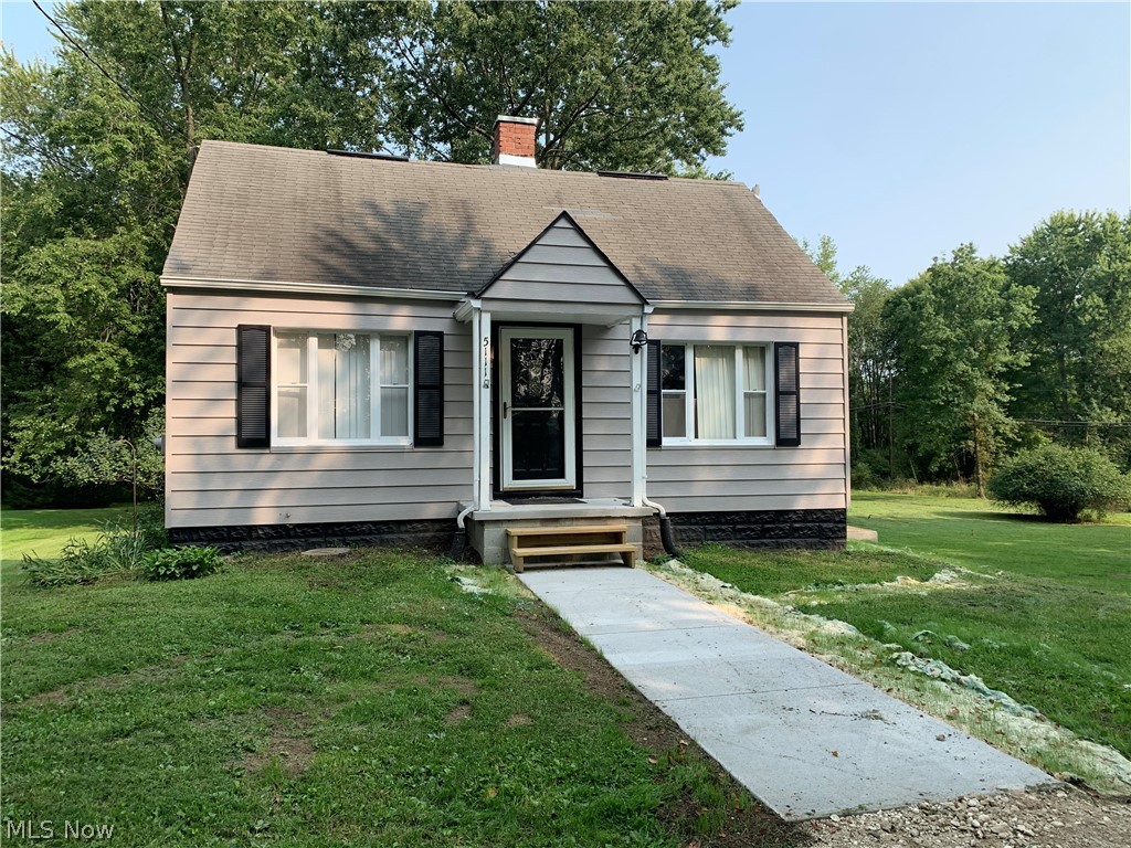 This charming bungalow with numerous fresh updates inside & out features one-floor living and an amazing location: a secluded dead-end drive with a scenic double lot! Inside features mostly new paint, flooring and windows throughout. The kitchen features a large pantry, a breakfast bar and easy access to the main floor laundry area. This is an opportunity for quiet country living just minutes from the conveniences of town!