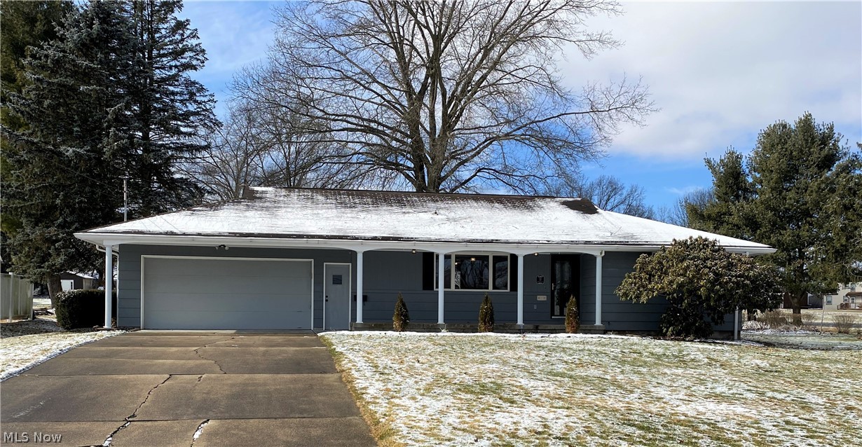 Columbiana, OH -LOCATION,LOCATION, LOCATION! Looking for a turn key ranch style home on a cul-de-sac, you've found it! The first floor of this lovely home offers a living room with a large picture window, dining area, kitchen with breakfast bar, laundry room, 2 bedrooms and TWO water closets. The basement is where you will find the 3rd water closet and the open shower. There is walk up storage space above the over sized 2 car garage. Closet space and storage space will not be a issue in this well maintained home! This spacious home boasts new LTV flooring, new carpeting in the bedrooms, new interior paint, new lighting, new water heater as well as many updates including: electric, furnace and air conditioning. During the warmer months you can relax on the front porch, the rear deck or on the enclosed rear porch. This home is within walking distance to Harvey S. Firestone Park which offers a swimming pool, basketball, tennis and pickleball courts, baseball field, football field, walking
